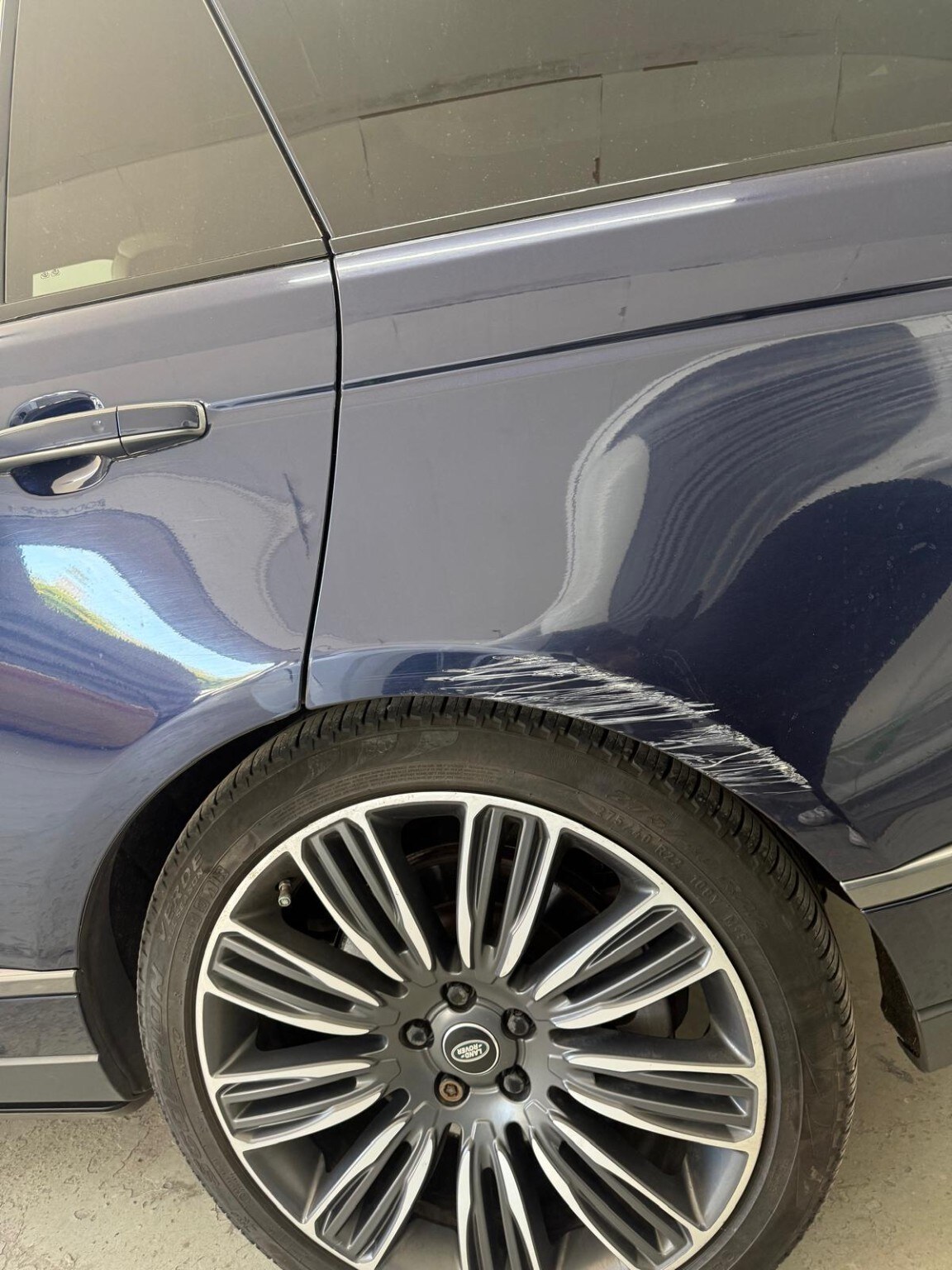 Range Rover rear door and wheel arch before repair